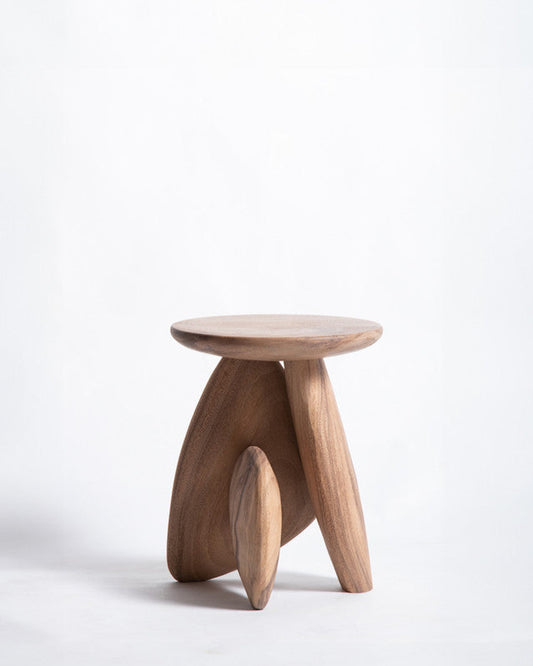 Wooden stool with a minimalist design on a white background